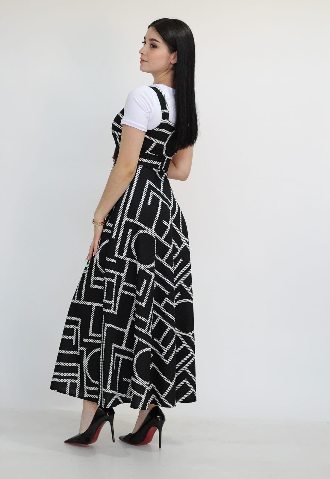 Overol Estampado Negro con cinto/blusa cuello blanca